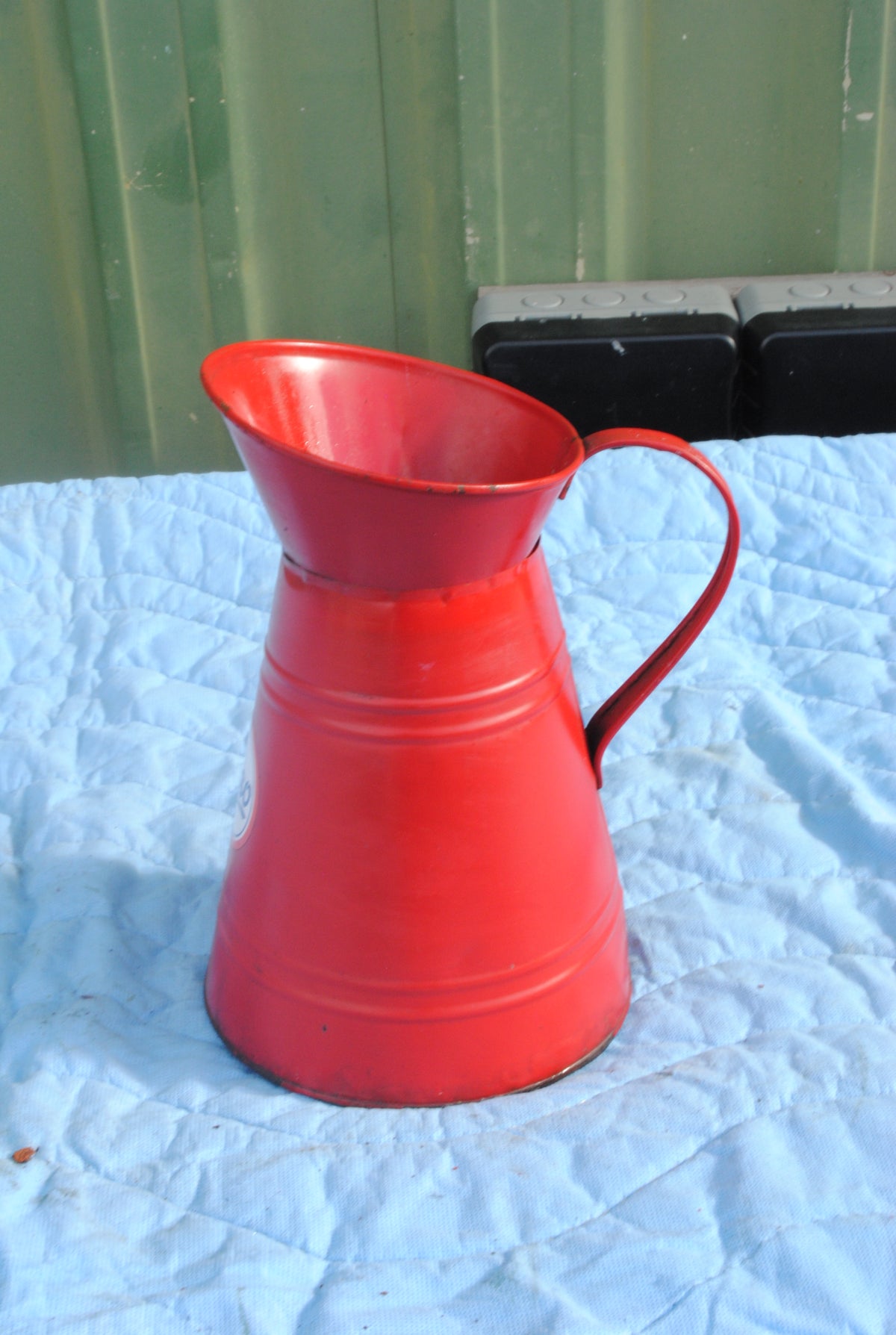 Esso branded red oil jug
