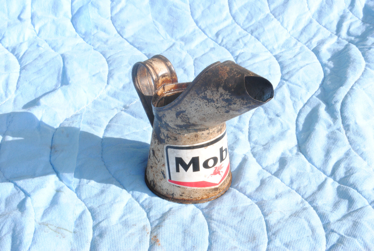 Mobil branded metal oil jug