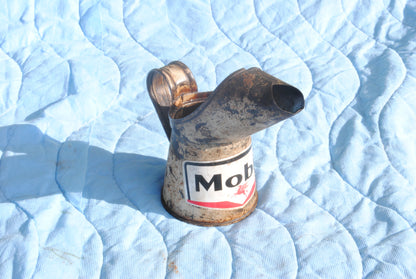 Mobil branded metal oil jug