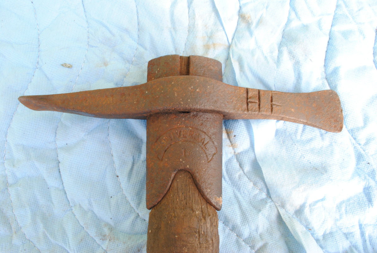 'HF Universal' Vintage Cast iron pickaxe