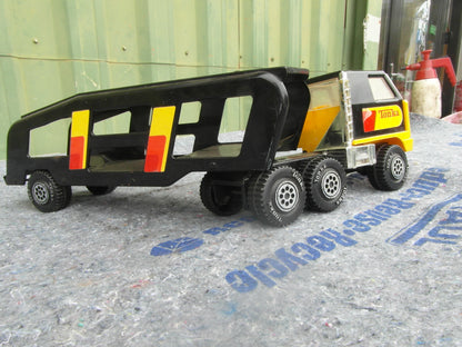 1970s Tonka Car transporter - Black and yellow pressed steel toy truck