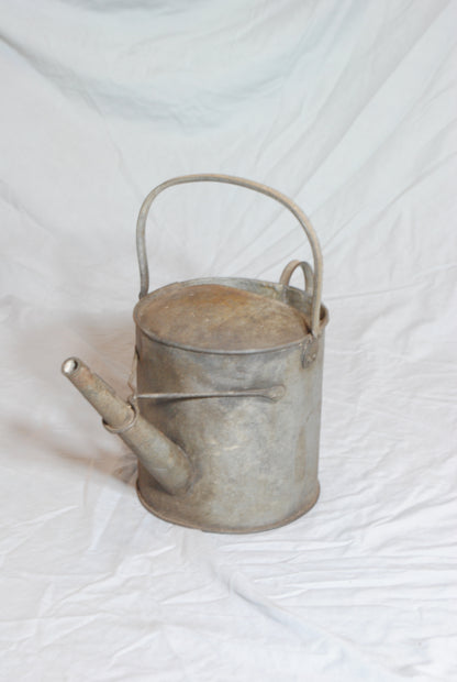 Vintage metal watering can