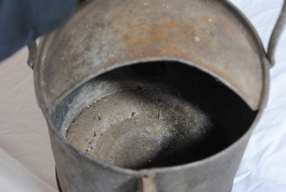 Vintage metal watering can